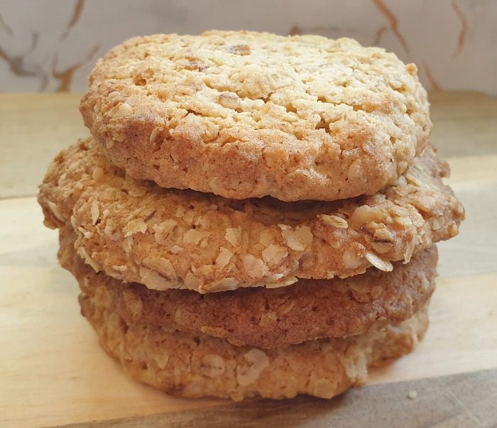 Easy Oat Cookie Recipe with cookies stacked on top of each other.