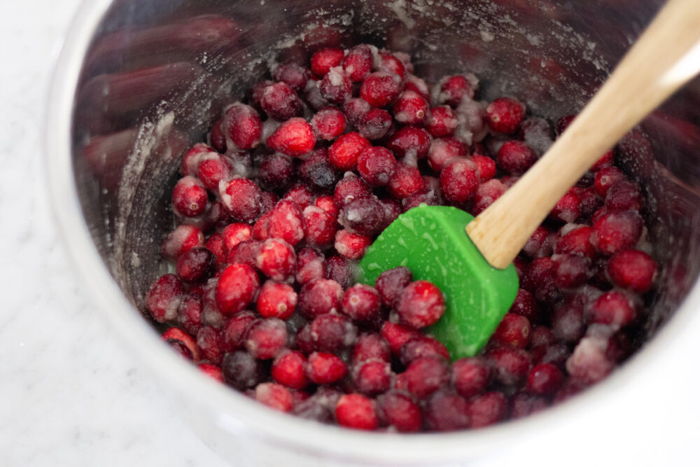 Mix cranberries with sugar